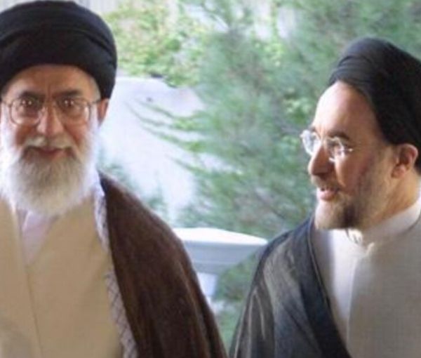 An undated photo showing Khamenei (L) with former president Khatami