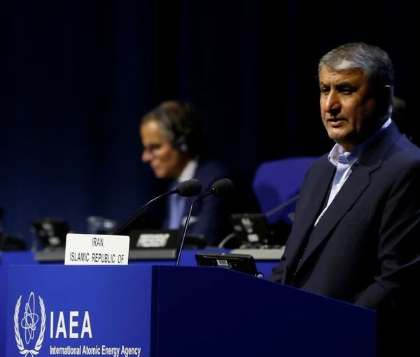 Head of Atomic Energy Organization of Iran Mohammad Eslami and International Atomic Energy Agency Director General Rafael Grossi attend the opening of the IAEA General Conference at their headquarters in Vienna, Austria, September 26, 2022.