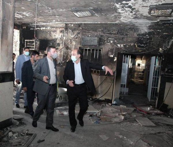 Regime officials visiting Evin Prison on Oct. 16, 2022