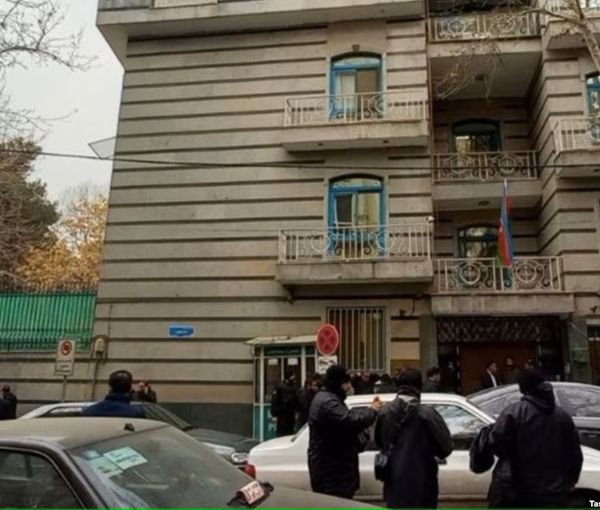 People seen outside the Azerbaijani embassy in Tehran on January 27, 2023