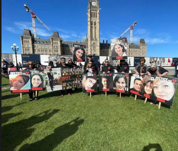 A gathering by the families of victims of Ukrainian flight PS752 in front of the Canadian Parliament in Ottawa on October 4, 2022