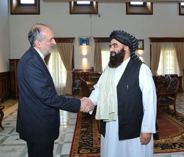 Iranian envoy Bahador Aminian meeting with a Taliban leader. Undated
