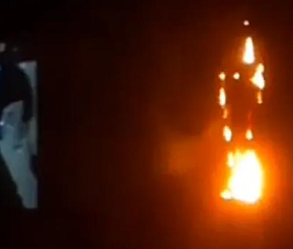 Screen grab from a video showing Ayatollah Khomeini's statue on fire in Qom. April 1, 2022