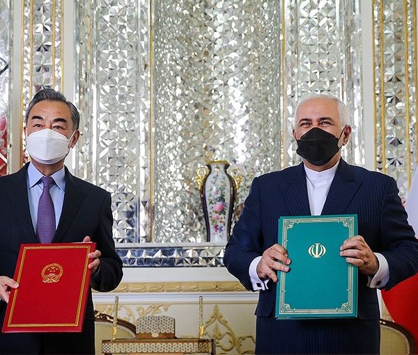 Chinese and Iranian foreign ministers showing 25-year cooperation agreement. Undated