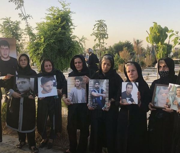 A group 'Mothers for Justice' with pictures of their children killed by security forces during protests