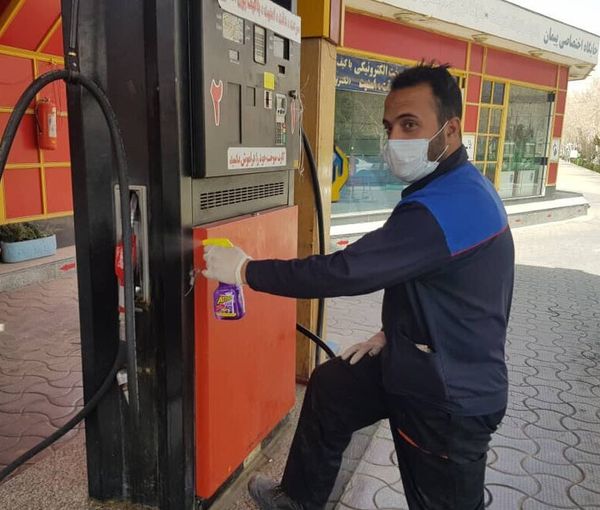 A gas station attendant in Tehran. FILE PHOTO
