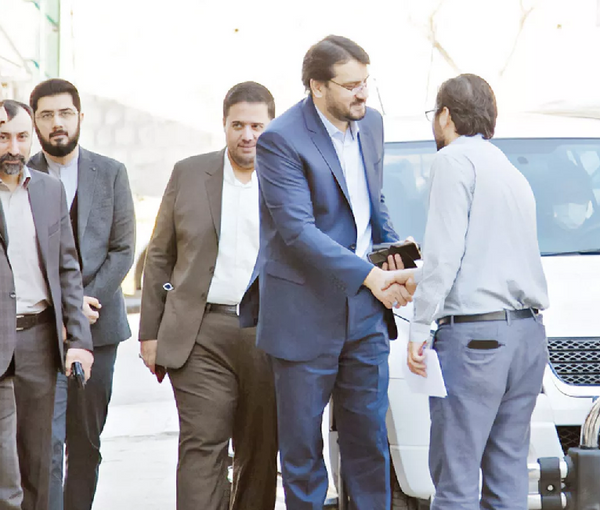 Mehrdad Bazrpash seen with a group of hardliners. Undated