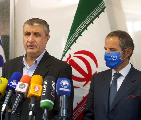 Mohammad Eslami (L) with IAEA's Rafael Grossi in Tehran in 2021