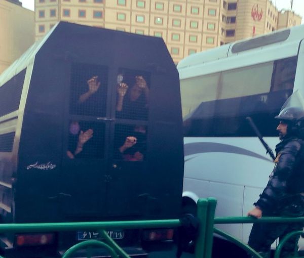 An Iranian police vehicle packed with detained protesters in September 2022