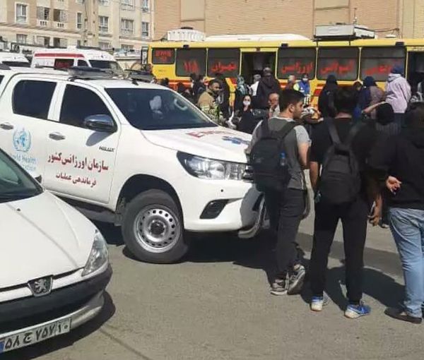 People gathered at the scene of one of the chemical attacks on schoolgirls in the capital Tehran. (March 2023)