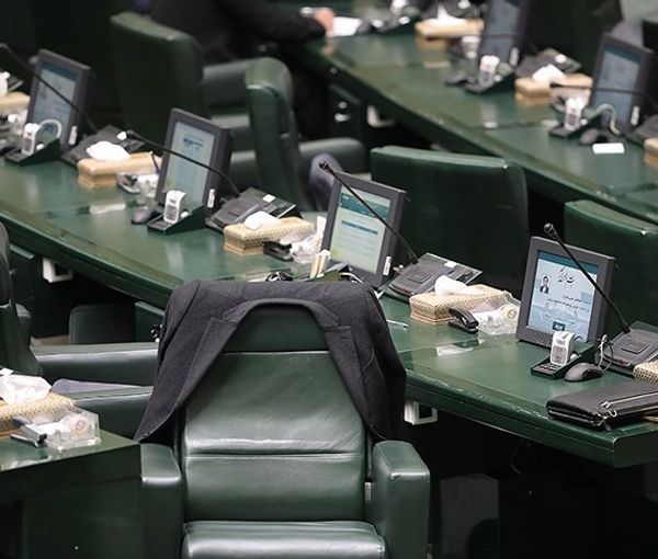 President Ebrahim Raisi with Hardliner supporters in parliament during his inauguration in August 2021