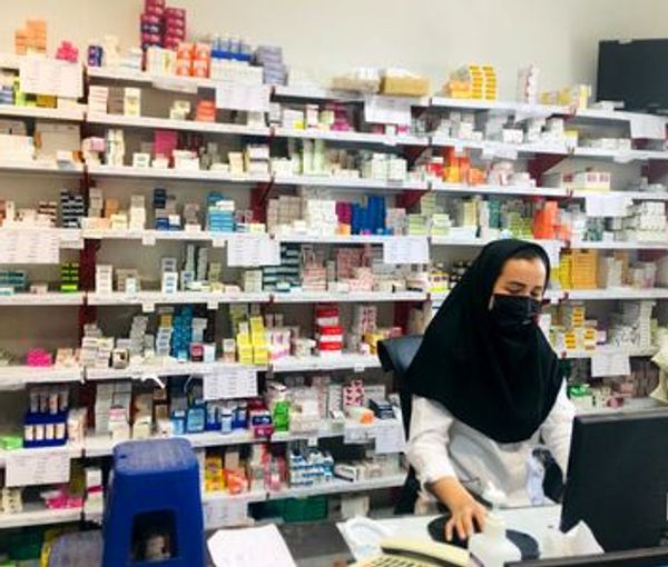 Iran-pharmacy-staff-black-hijab  (file photo)
