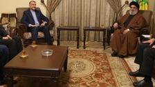 Lebanon's Hezbollah leader Seyyed Hassan Nasrallah meets with Iranian Foreign Minister Hossein Amir-Abdollahian in this handout picture in an unidentified location and released by Hezbollah Media Office on January 13, 2023.  