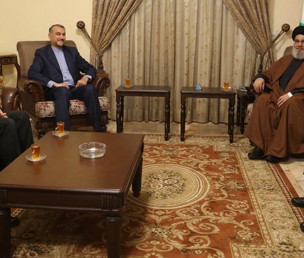 Lebanon's Hezbollah leader Seyyed Hassan Nasrallah meets with Iranian Foreign Minister Hossein Amir-Abdollahian in this handout picture in an unidentified location and released by Hezbollah Media Office on January 13, 2023.  