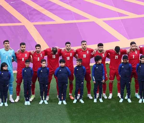 Iranian players line up during the national anthems before the match against England on November 21, 2022.