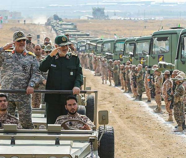 Revolutionary Guard's commander-in-chief Hossein Salami (in green) during a war game in 2022
