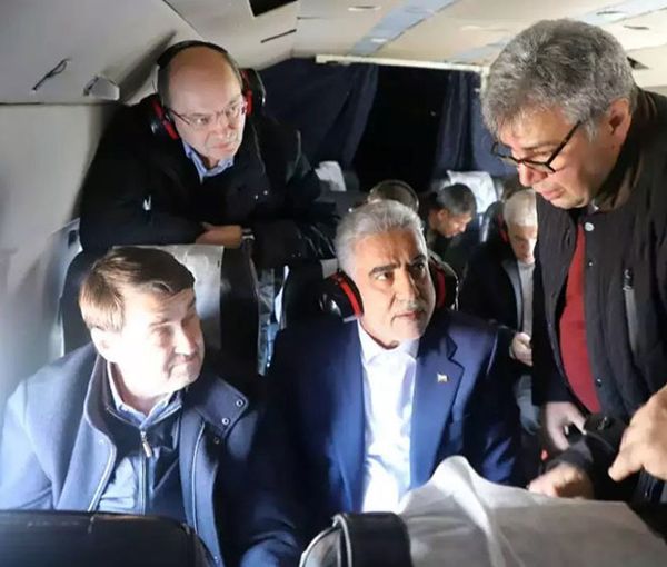 Russian presidential aide and State Council Secretary Igor Levitin (left) during an aerial inspection of the Rasht-Astara rail project in northern Iran on January 18, 2023  