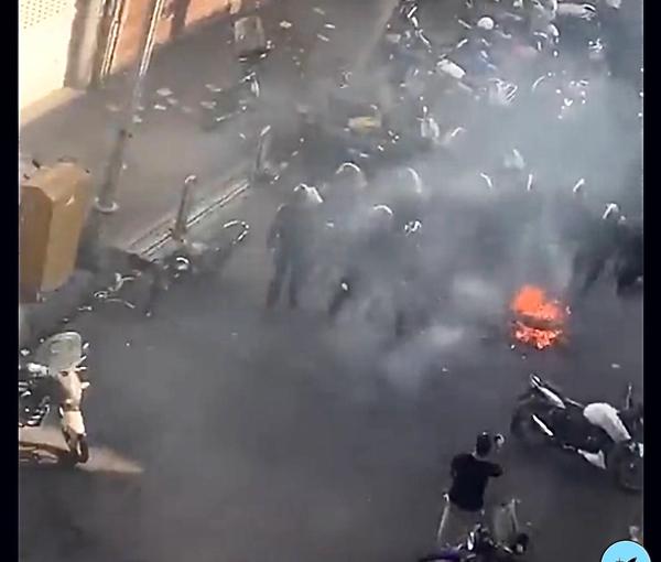 Special police units dispersing protesters in Tehran's Lalehzar street on October 12, 2022