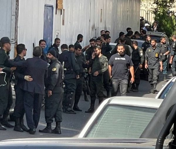 Iranian security forces waiting in Tehran to attack a university on October 3, 2022