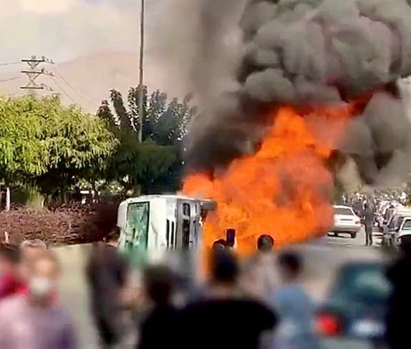 A large protest in Karaj, near Tehran on November 3 turned violent, with a police car attacked and disarmed