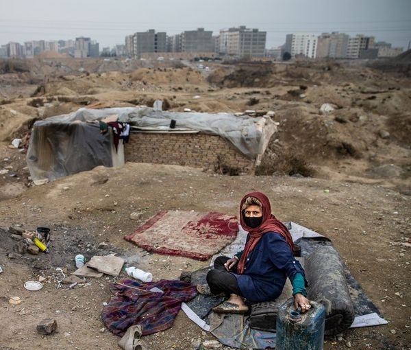 A poor woman living on the outskirts of Tehran without shelter. Undates
