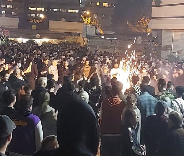 People in Tehran's Ekbatan district mark the start of Nowruz in a show of defiance. March 14, 2023