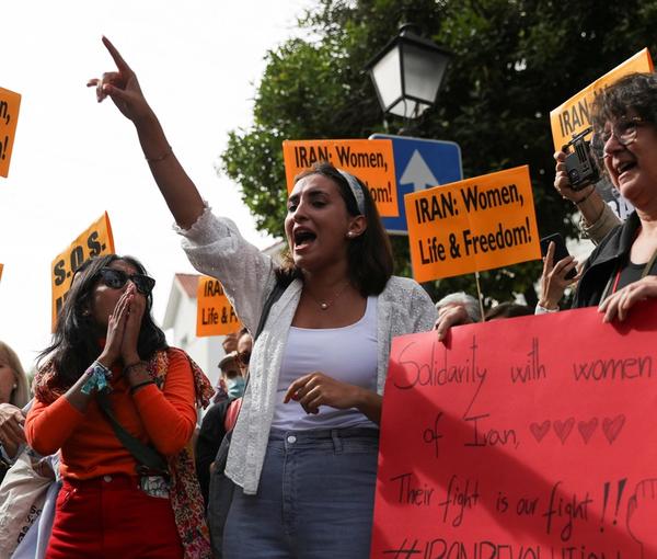 Women protesting in Madrid to support freedom for their Iranian peers, Sept. 28, 2022