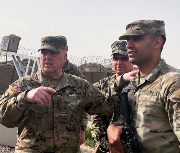 U.S. Joint Chiefs Chair Army General Mark Milley speaks with U.S. forces in Syria during a visit at a US military base in Northeast Syria, March 4, 2023
